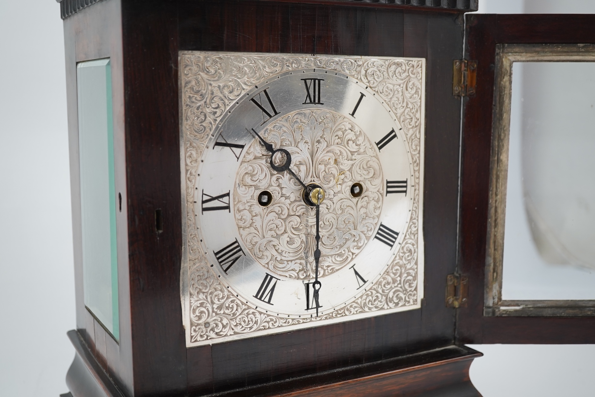 A William IV four glass rosewood double fusee library clock by James Muirhead